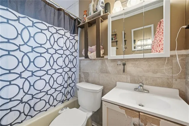 a bathroom with a sink and a toilet