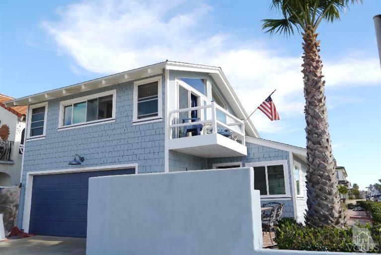 880 Mandalay Beach Road Oxnard, CA 93035 - Photo 4 of 21 a front view of a house with balcony