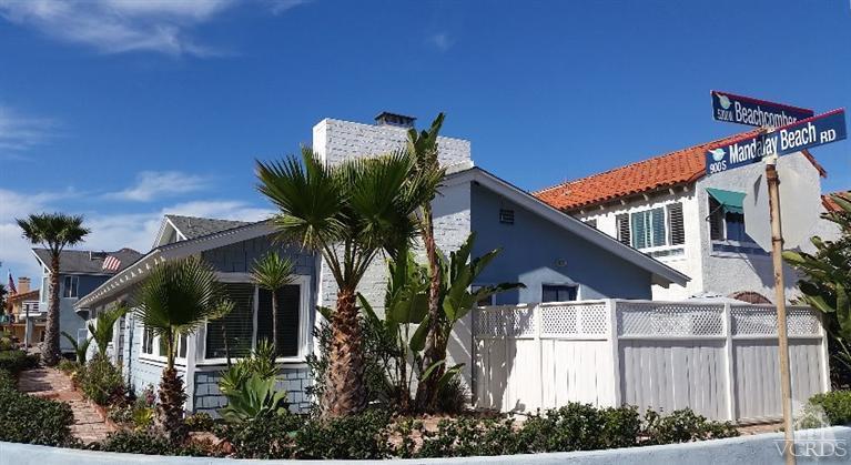 880 Mandalay Beach Road Oxnard, CA 93035 - Photo 5 of 21 a view of a house with a flower garden