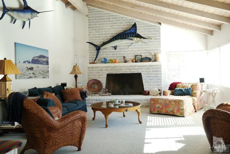880 Mandalay Beach Road Oxnard, CA 93035 - Photo 8 of 21 a living room with furniture and a fireplace
