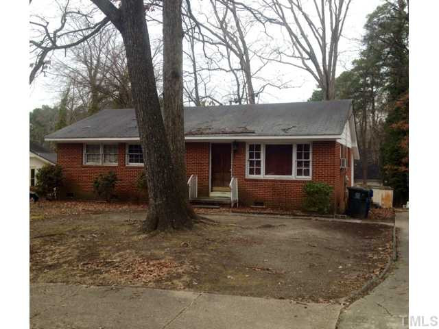 524 Cooper Road Raleigh, NC 27610 - Photo 1 of 12 a view of a house with a tree in the background