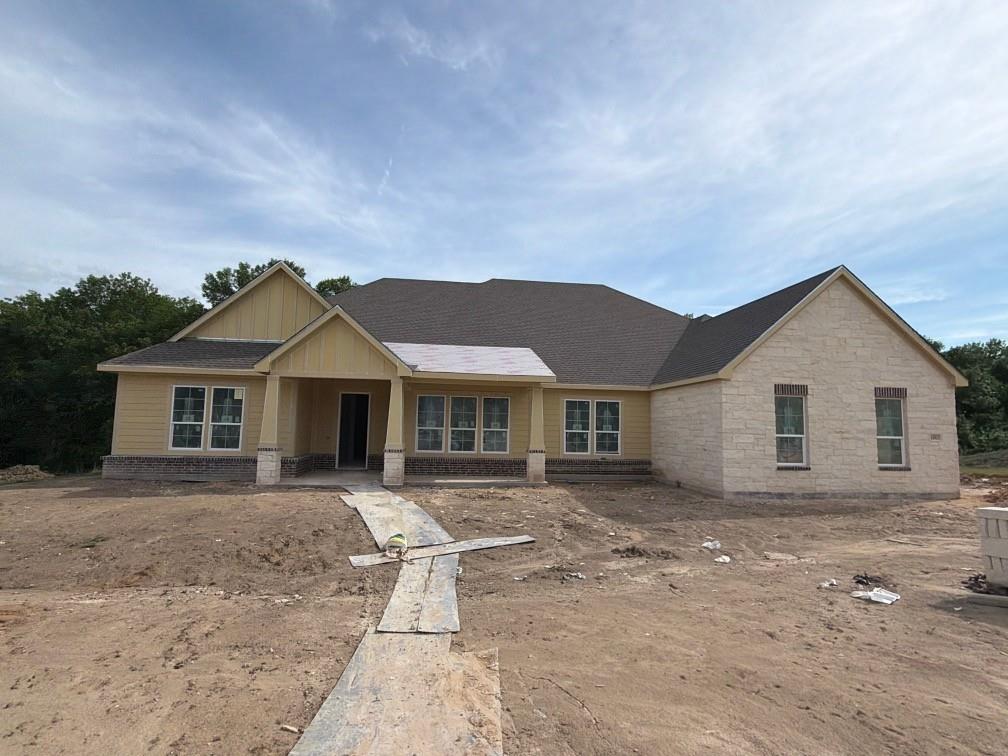 1003 Perrin Lane Van Alstyne, TX 75495 - Photo 3 of 18 front view of a house with a yard