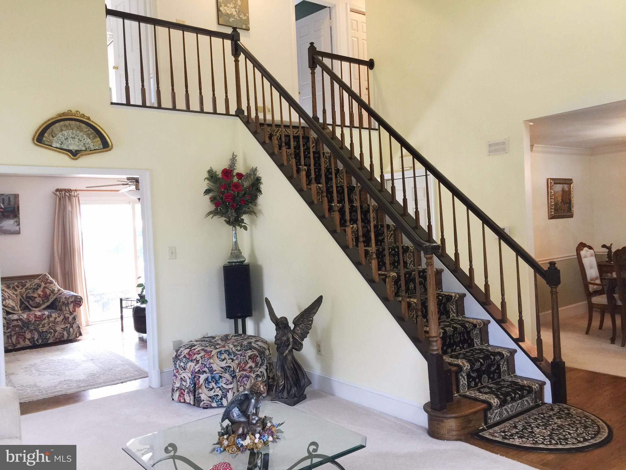 6224 Medora Road Linthicum, MD 21090 - Photo 3 of 29 a view of entryway and hall with wooden floor