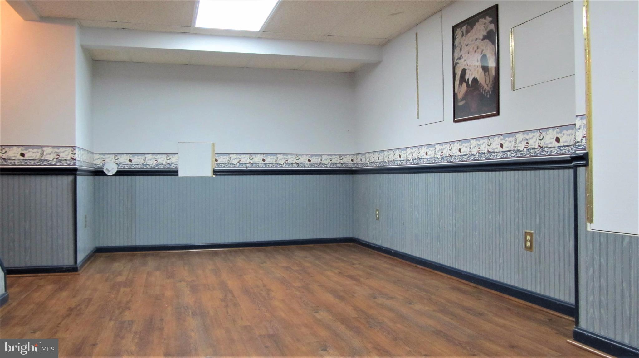 6224 Medora Road Linthicum, MD 21090 - Photo 22 of 29 a view of a room with wooden floor