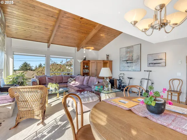 a very nice looking living room with a large window