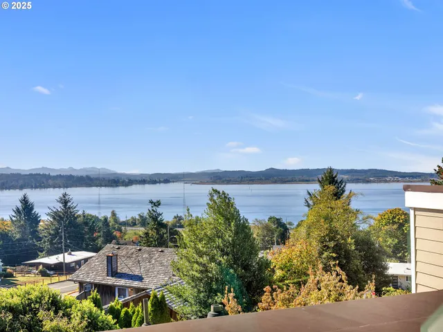 a view of a lake with a garden