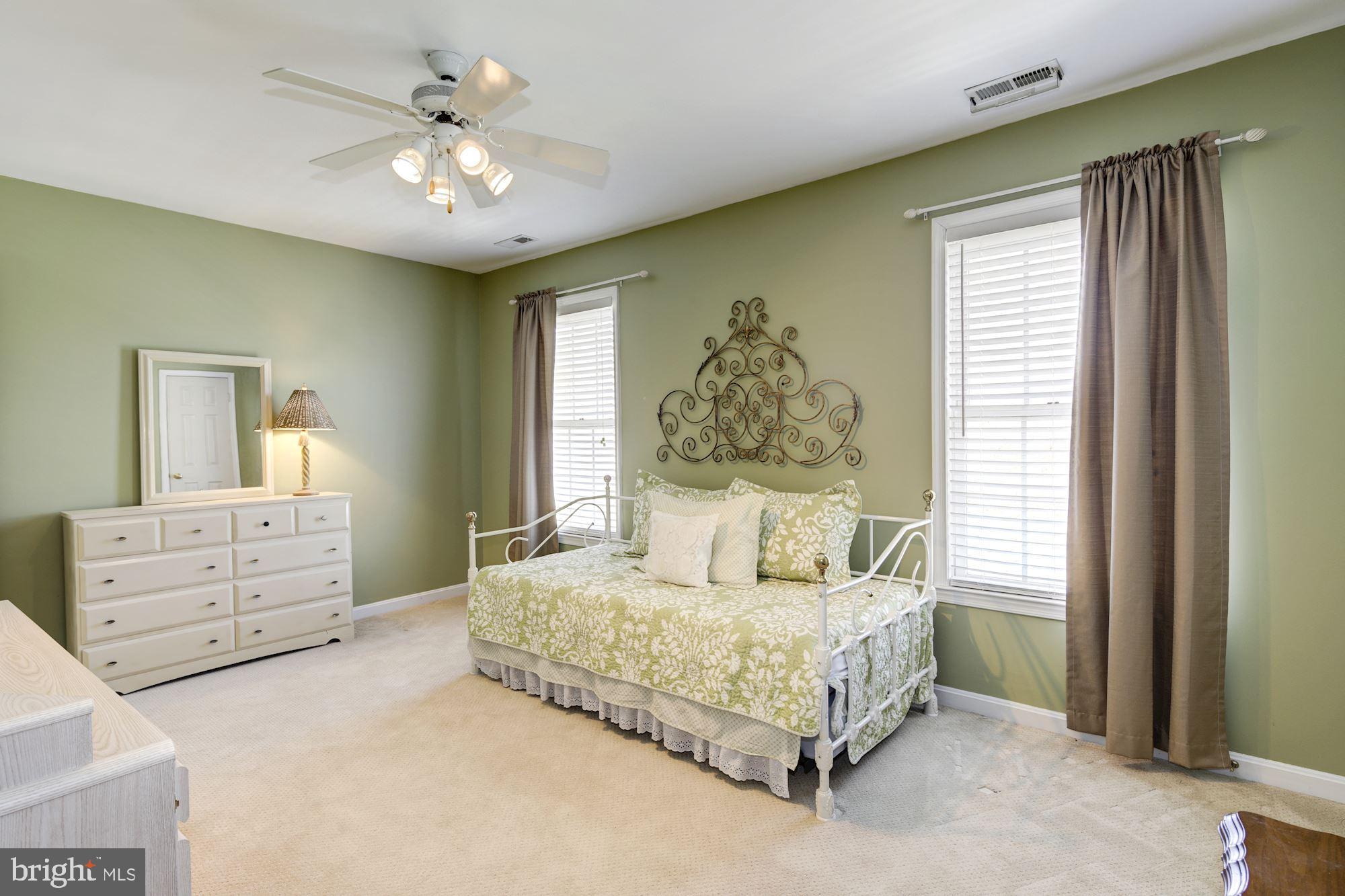 2005 Kingsforth Drive Fallston, MD 21047 - Photo 42 of 53 a bedroom with a bed and a chandelier