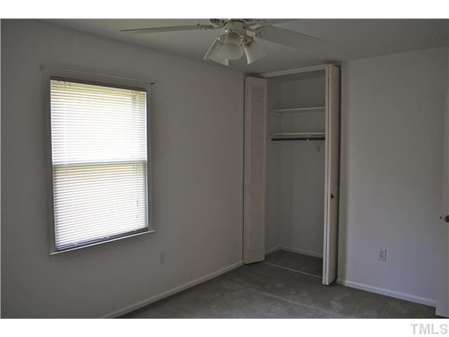 1326 Sedwick Road Durham, NC 27713 - Photo 8 of 19 a view of an empty room with a window