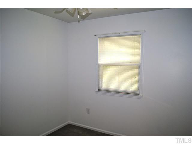 1326 Sedwick Road Durham, NC 27713 - Photo 9 of 19 a view of an empty room and a window