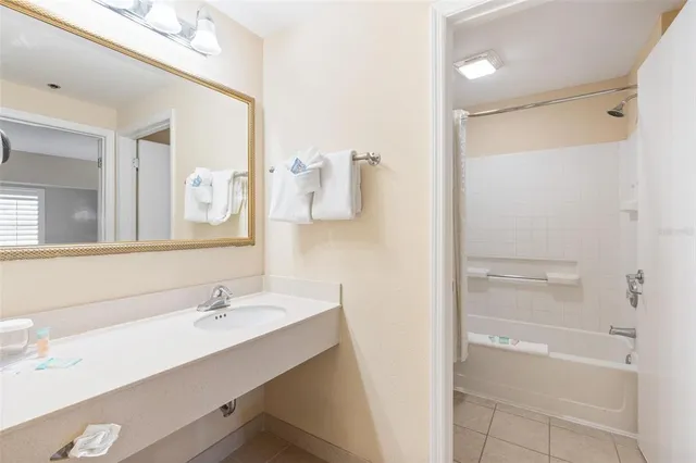 a bathroom with a toilet and a bathtub