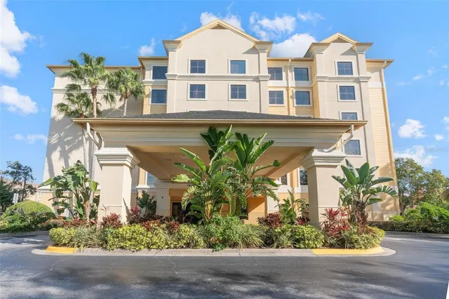an aerial view of residential building and lake view