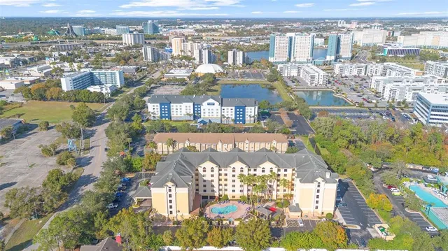 a sign that is sitting in front of flowers