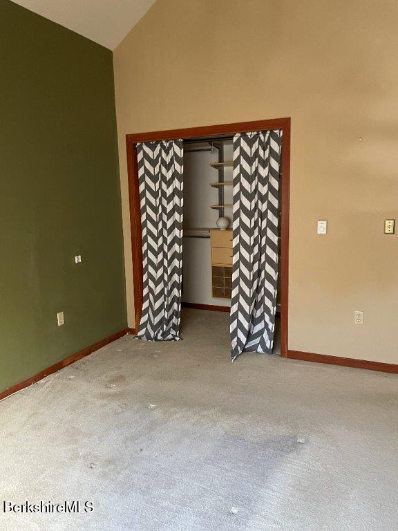 1 Pondview Drive, Unit C3 Pittsfield, MA 01201 - Photo 12 of 20 an empty room with a book shelf