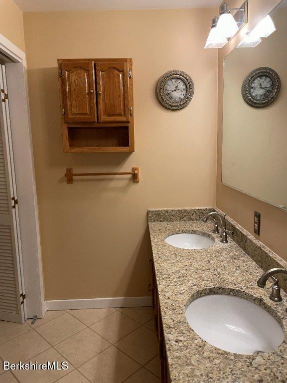 1 Pondview Drive, Unit C3 Pittsfield, MA 01201 - Photo 13 of 20 a bathroom with a granite countertop sink and a mirror