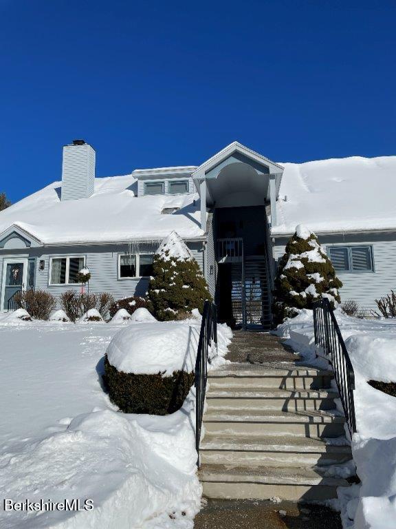 1 Pondview Drive, Unit C3 Pittsfield, MA 01201 - Photo 20 of 20 a view of a patio with table and chairs potted plants