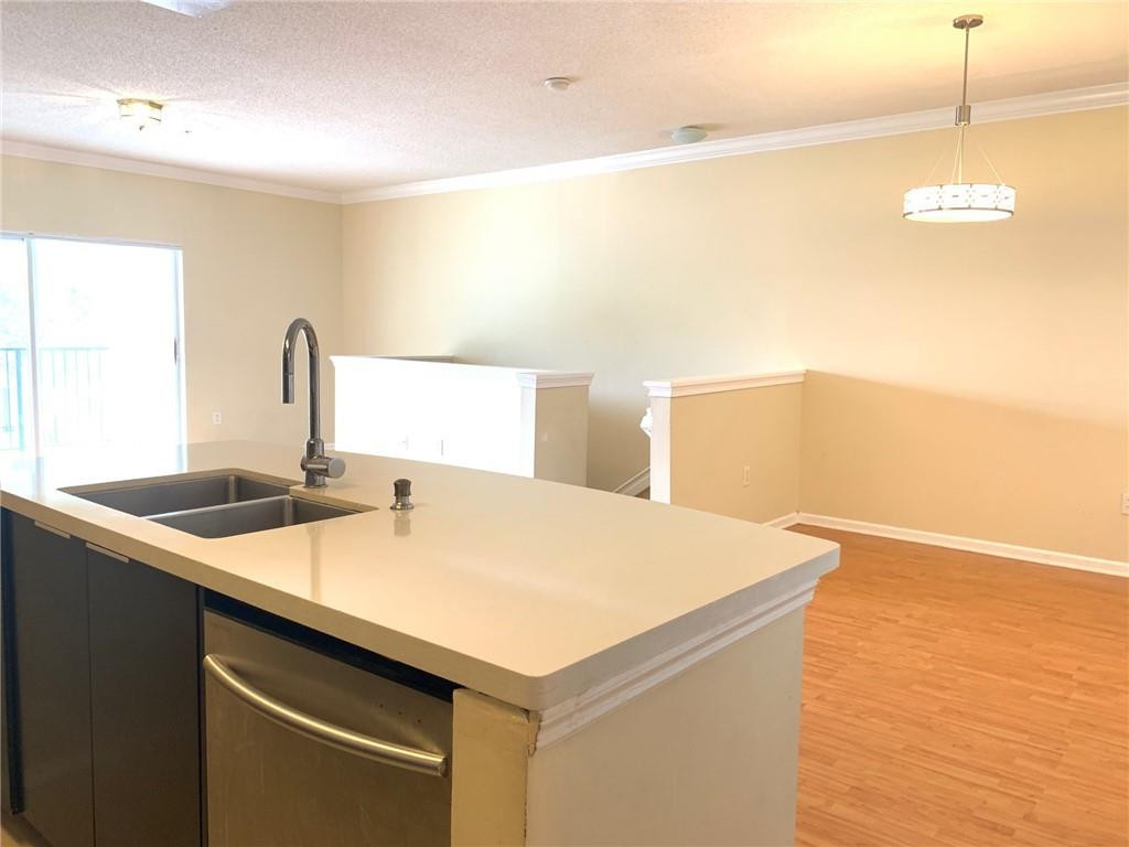 5980 West Sample Road, Unit 303 Coral Springs, FL 33067 - Photo 20 of 32 a close view of sink and tap