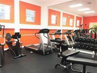 5980 West Sample Road, Unit 303 Coral Springs, FL 33067 - Photo 27 of 32 a view of a room with gym equipment