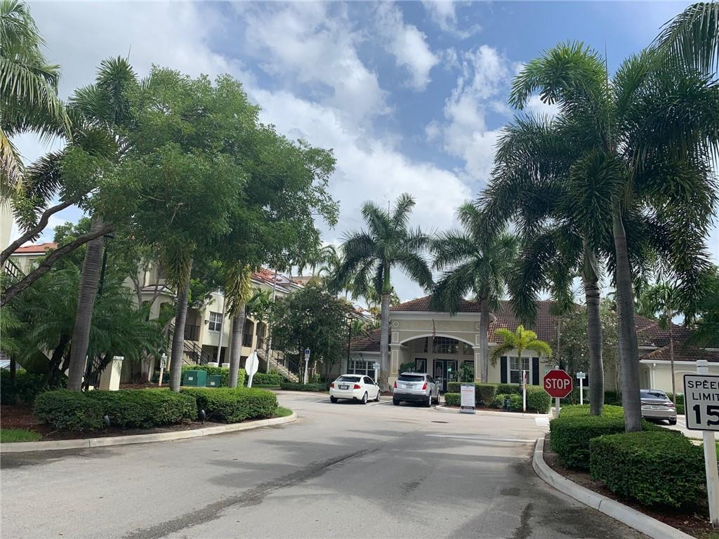 5980 West Sample Road, Unit 303 Coral Springs, FL 33067 - Photo 30 of 32 a view of a building and a street