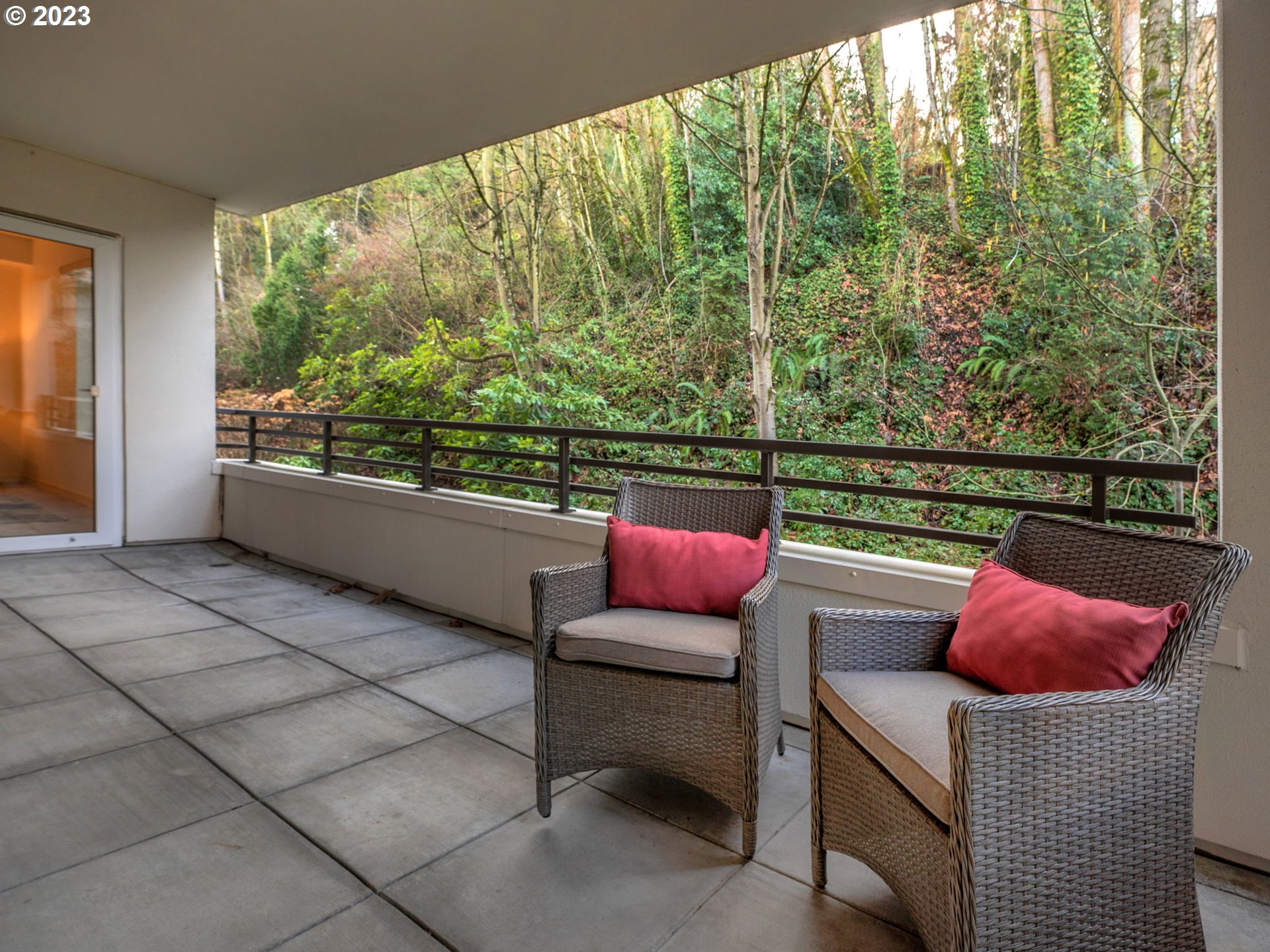 2445 Northwest Westover Road, Unit 314 Portland, OR 97210 - Photo 19 of 32 a outdoor sitting area with couch and a table