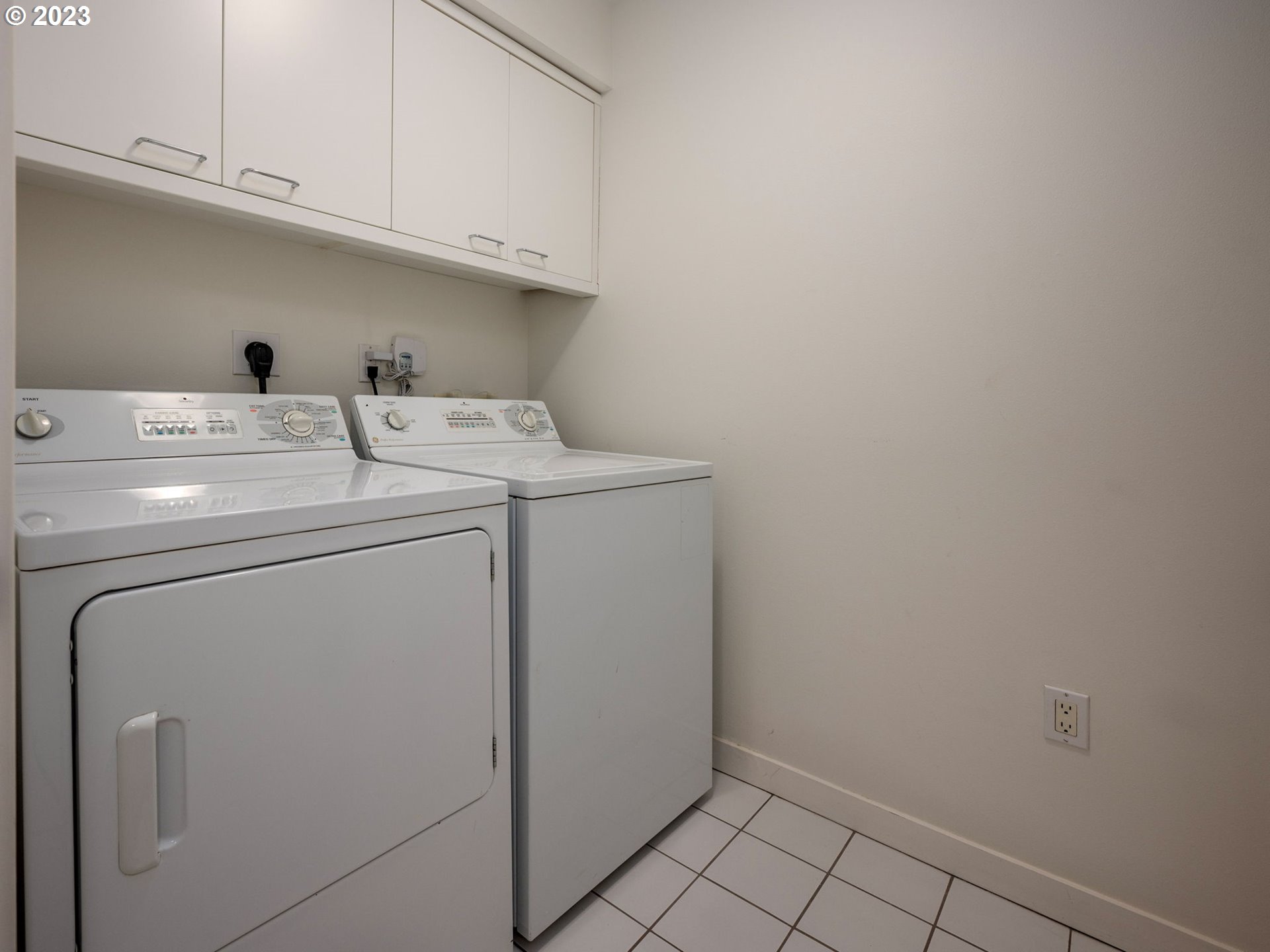 2445 Northwest Westover Road, Unit 314 Portland, OR 97210 - Photo 27 of 32 a utility room with dryer and washer