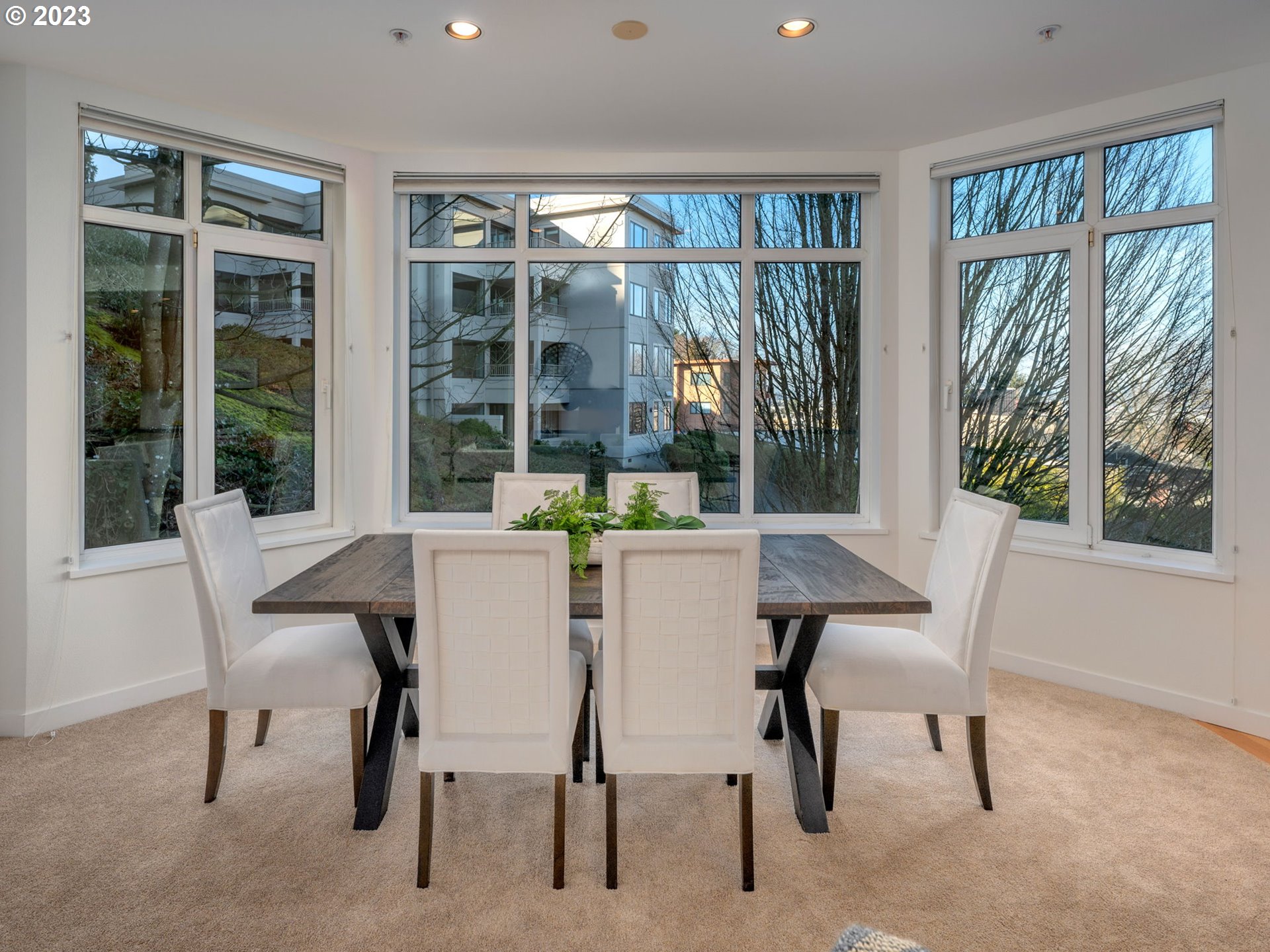 2445 Northwest Westover Road, Unit 314 Portland, OR 97210 - Photo 5 of 32 a dining room with furniture and window