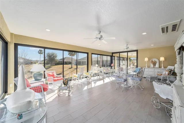 a living room with furniture and a view of living room