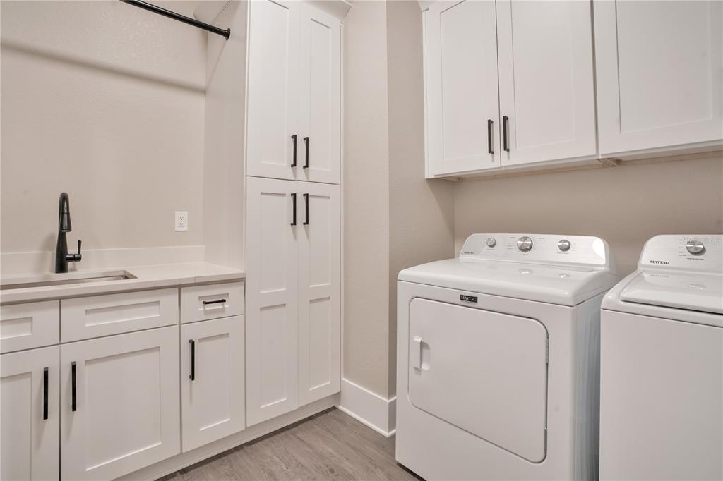 440 Palma Ceia Road Winter Haven, FL 33884 - Photo 48 of 78 a utility room with dryer and washer