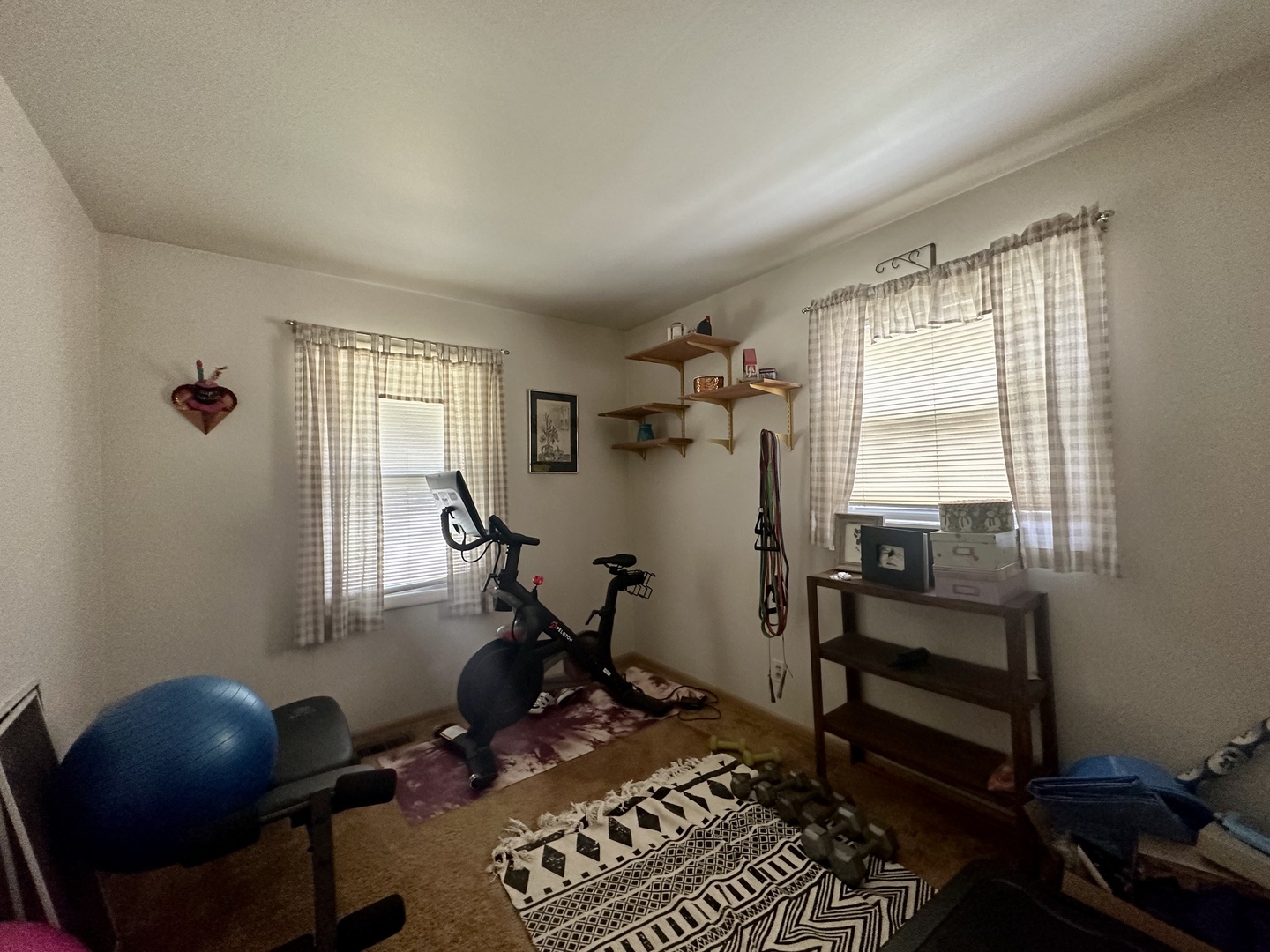 701 Parkside Circle Streamwood, IL 60107 - Photo 6 of 13 a room with furniture and a window