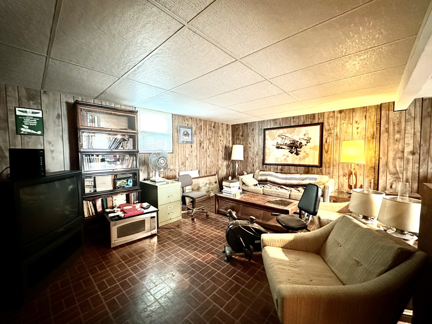 701 Parkside Circle Streamwood, IL 60107 - Photo 8 of 13 a living room with furniture and a flat screen tv