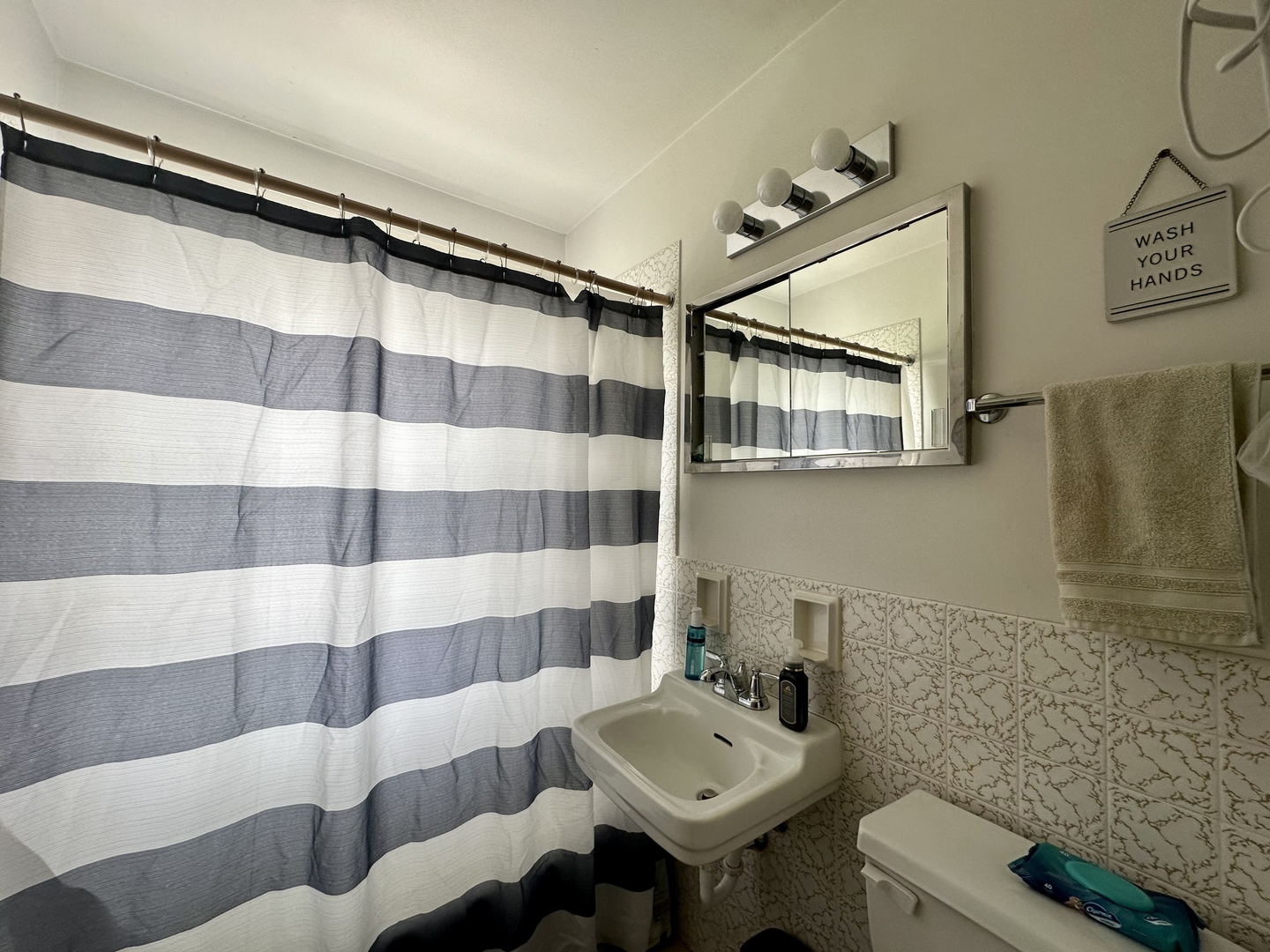 701 Parkside Circle Streamwood, IL 60107 - Photo 9 of 13 a bathroom with a sink and mirror