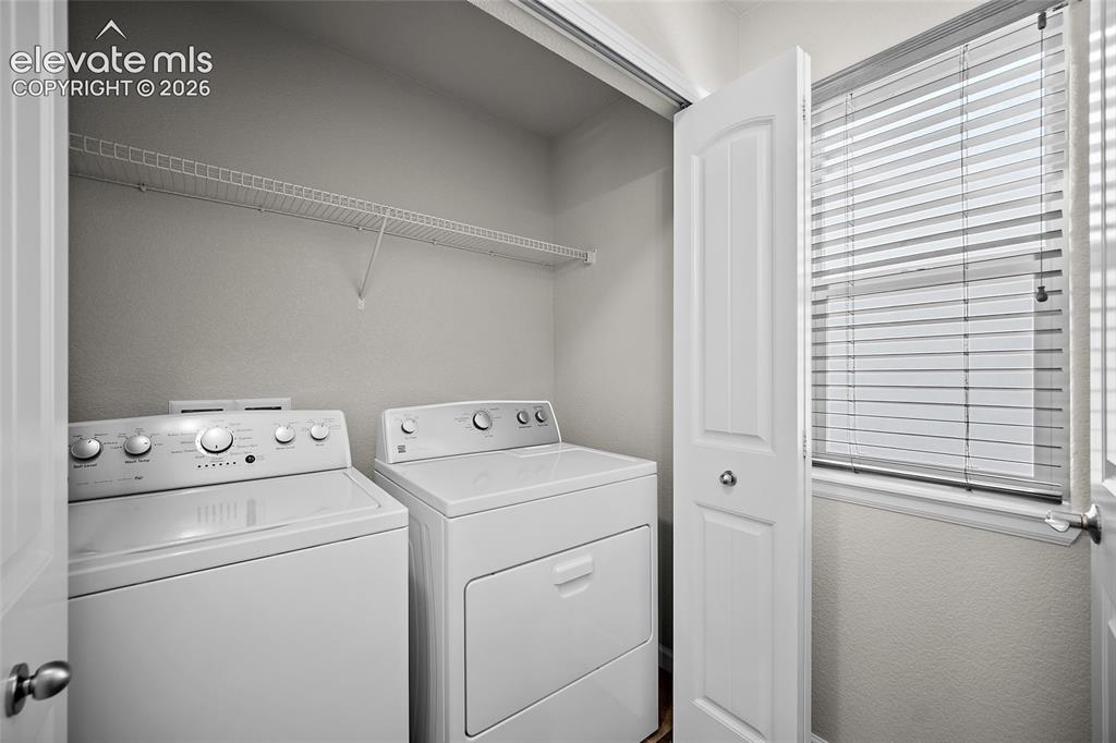 11447 Rill Point Colorado Springs, CO 80921 - Photo 15 of 42 main level laundry