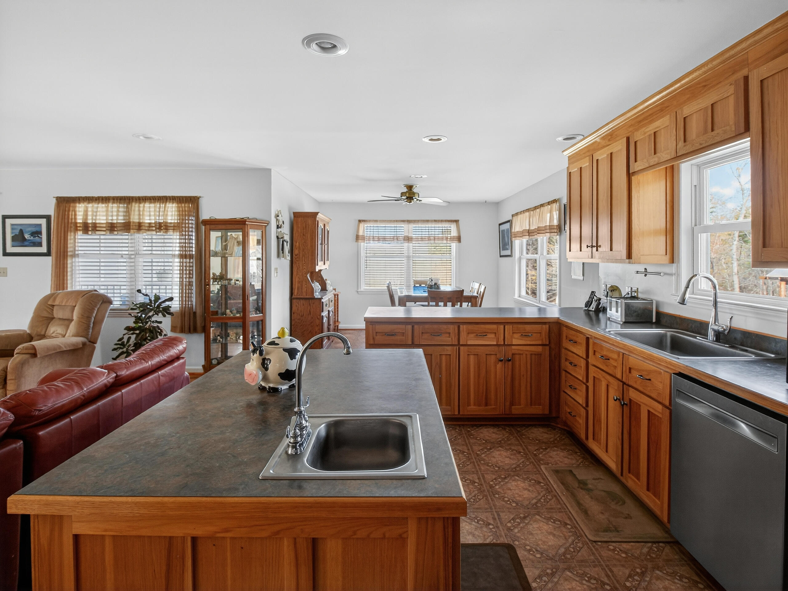 498 Meeks Road Penhook, VA 24137 - Photo 17 of 74 a kitchen that has a sink and a stove in it