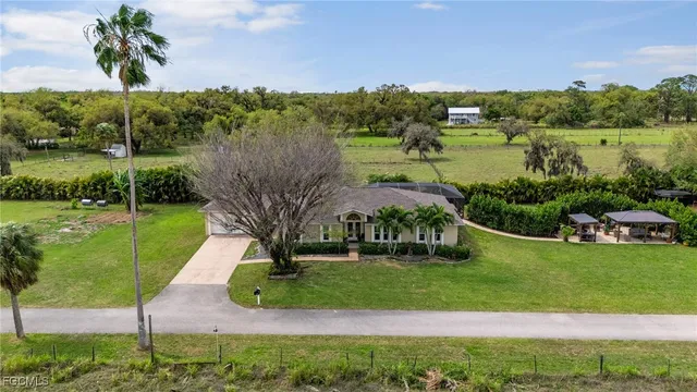 a view of a lake with a yard