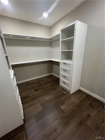 a view of an empty walk in closet