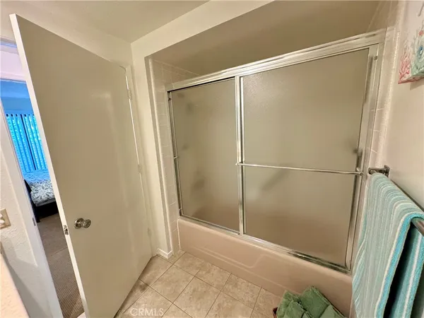 a bathroom with a sink toilet and mirror