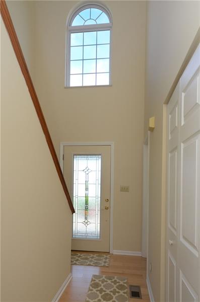 4 Wellington Court McKees Rocks, PA 15136 - Photo 2 of 24 2 STORY OPEN ENTRY WITH NEW HARDWOOD FLOORS AND NEWER BEVELED GLASS FRONT DOOR