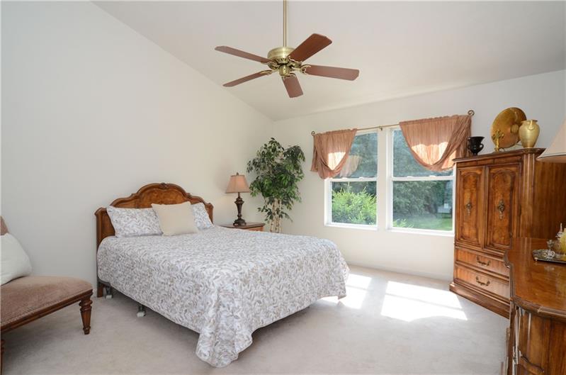 4 Wellington Court McKees Rocks, PA 15136 - Photo 13 of 24 MASTER SUITE WITH NEUTRAL CARPET AND DECOR