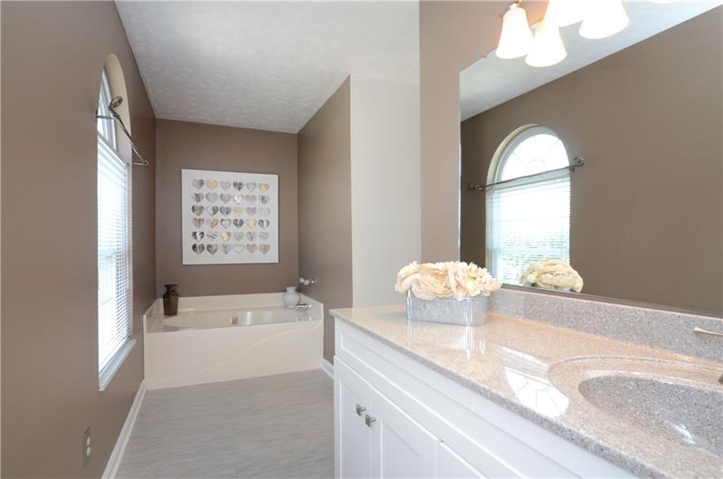 4 Wellington Court McKees Rocks, PA 15136 - Photo 15 of 24 UPDATED MASTER BATH WITH GARDEN TUB, WALK-IN SHOWER, NEW VANITY AND FIXTURES