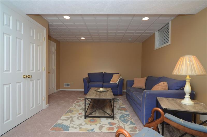 4 Wellington Court McKees Rocks, PA 15136 - Photo 20 of 24 GAMEROOM WITH NEW CARPET AND CEILING
