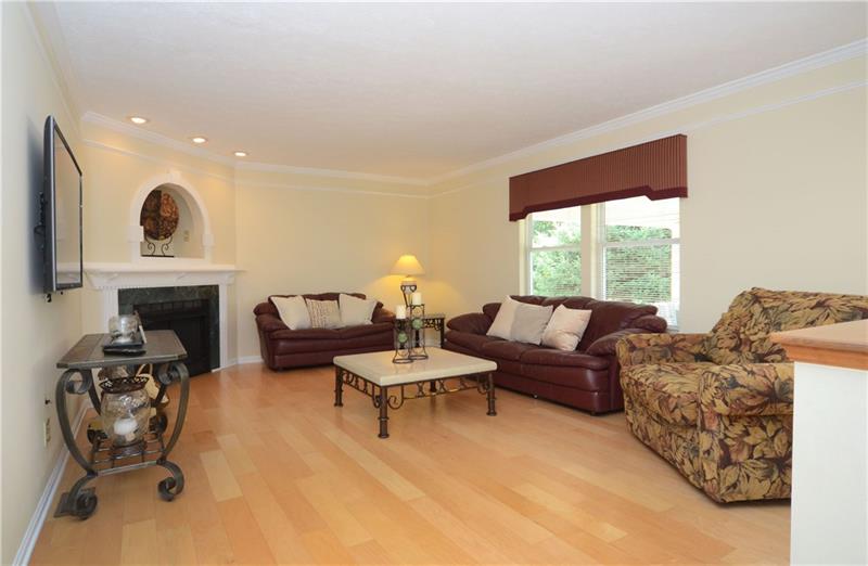 4 Wellington Court McKees Rocks, PA 15136 - Photo 9 of 24 FAMILY ROOM WITH NEW HARDWOOD FLOORS