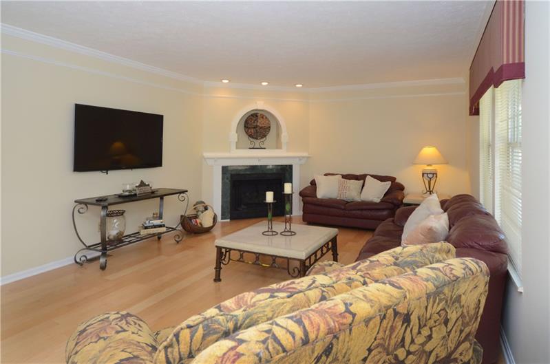 4 Wellington Court McKees Rocks, PA 15136 - Photo 10 of 24 GAS LOG FIREPLACE WITH ACCENT LIGHTING