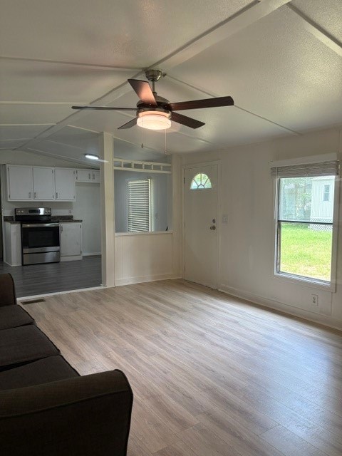 154 Mills Village Road Livingston, TX 77351 - Photo 3 of 16 Hallway view into living room and kitchen