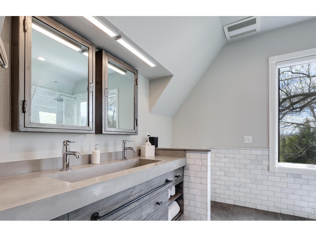 5575 St Vrain Road Longmont, CO 80503 - Photo 28 of 50 Primary bathroom with dual vanities and double trough sink