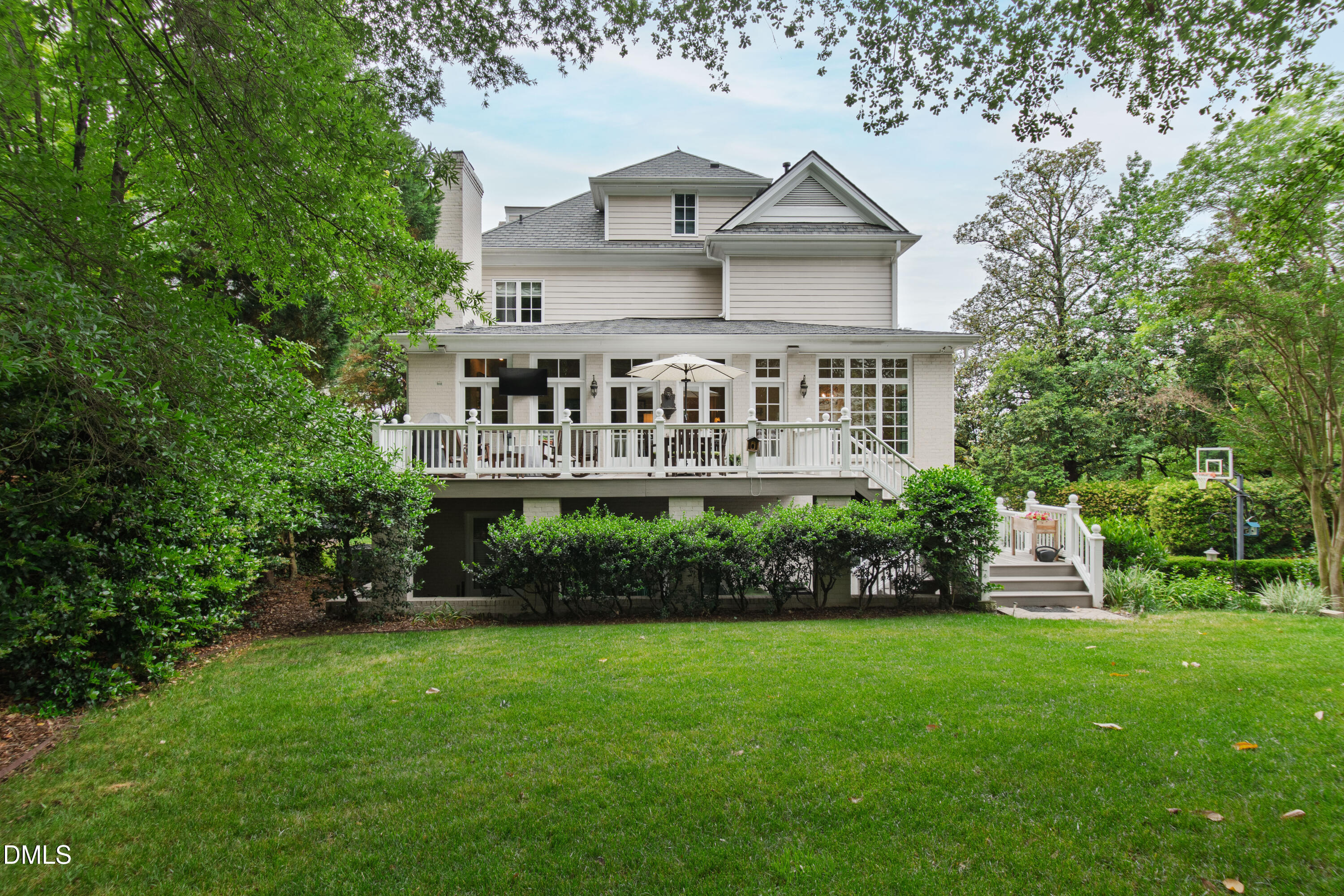 2536 Wake Drive Raleigh, NC 27608 - Photo 72 of 74 a front view of a house with a yard and green space
