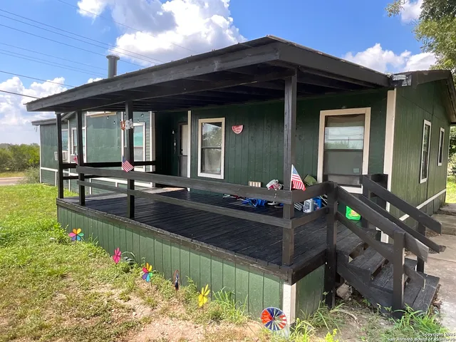 a front view of a house with patio