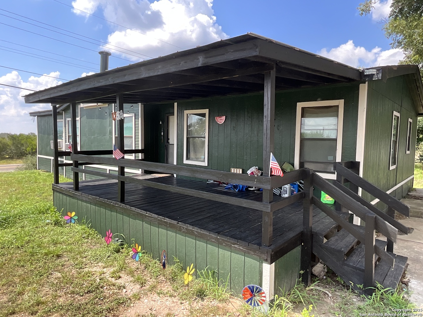 1 3rd Street Pettus, TX 78146 - Photo 8 of 16 a front view of a house with patio