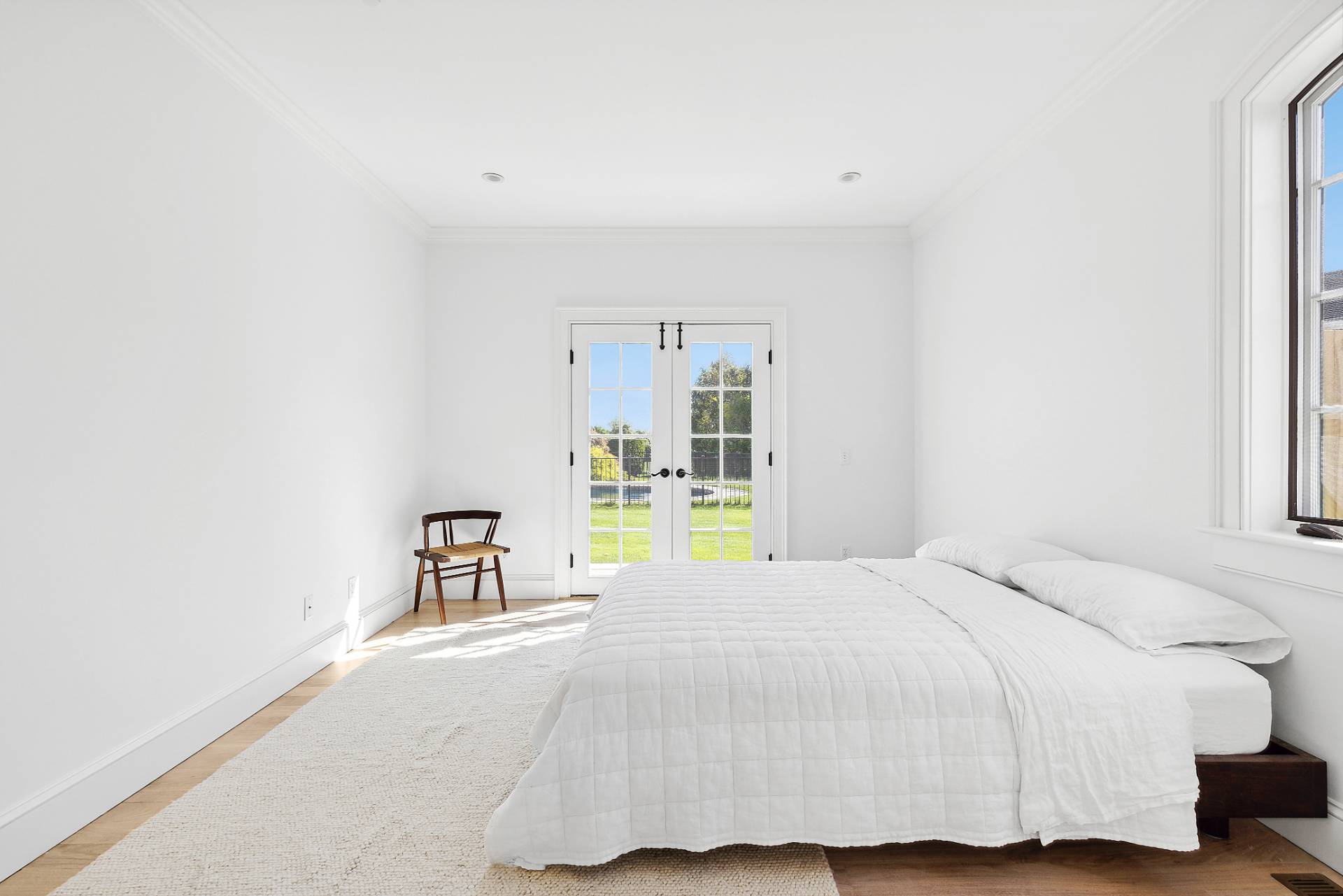 17 Jordan Drive Water Mill, NY 11976 - Photo 20 of 25 a bedroom with a bed and a window