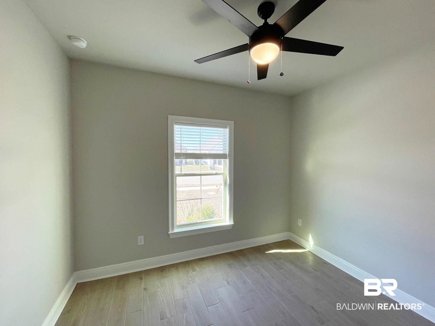 1392 Fenton Circle Foley, AL 36535 - Photo 10 of 17 Spare room featuring ceiling fan and light hardwood / wood-style flooring