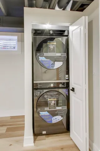a utility room with washer and dryer