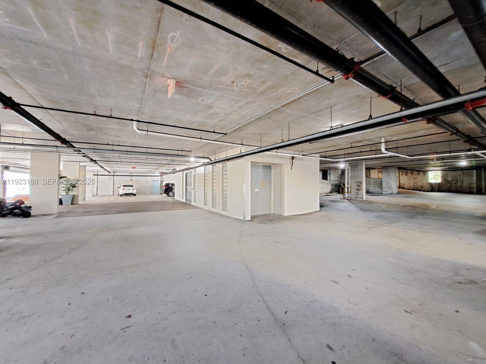 120 Southwest 8th Avenue, Unit 802 Miami, FL 33130 - Photo 20 of 31 a view of a car garage